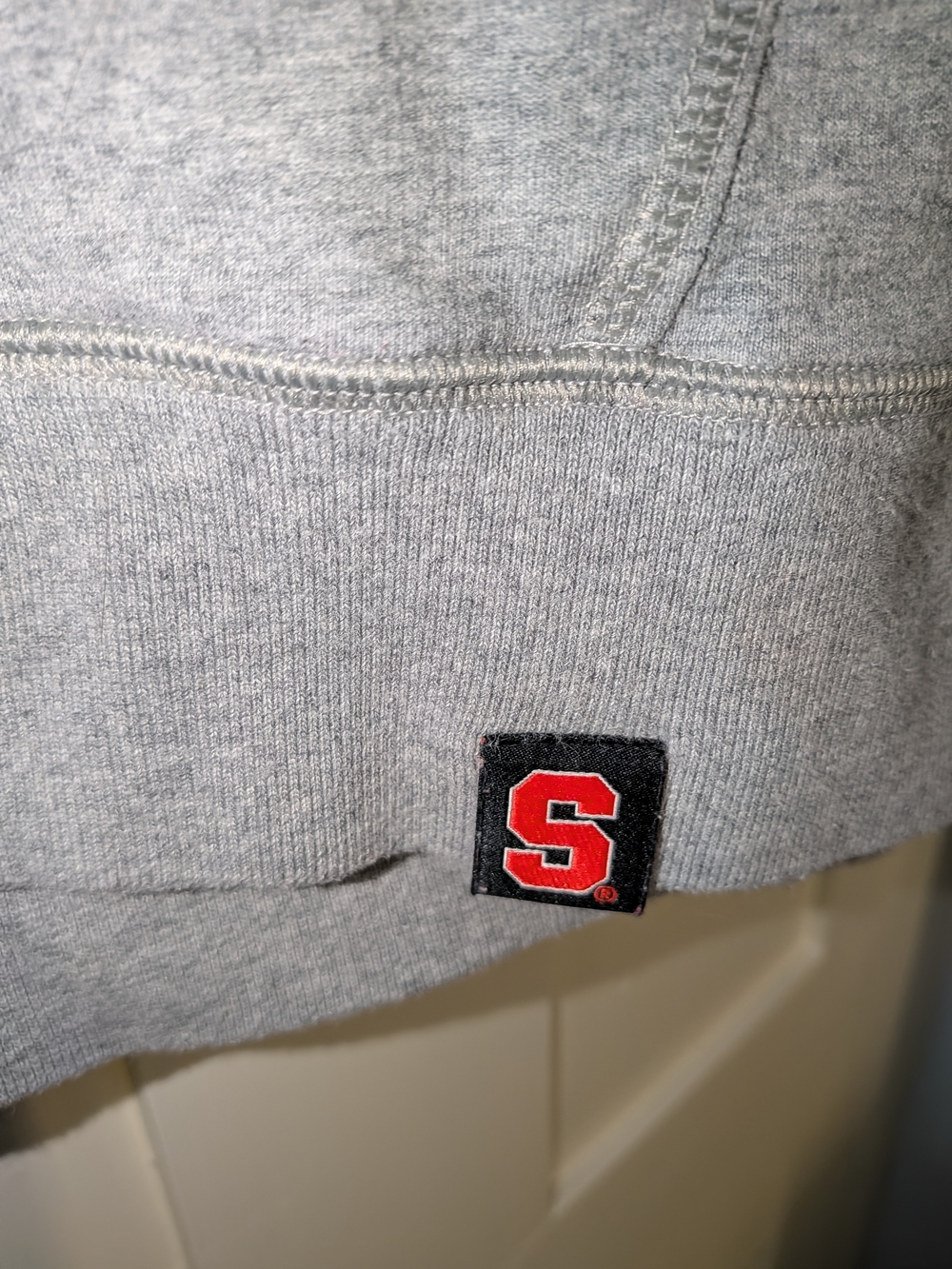 Nike Gray Pullover Hoodie with Black Sleeves and Orange Accents - Picture 5 of 6